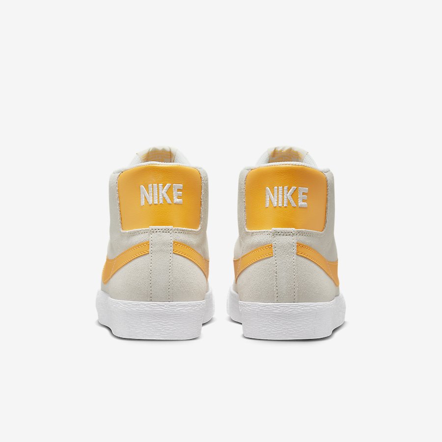 Giày Nike SB Zoom Blazer Mid Nữ Trắng Vàng 